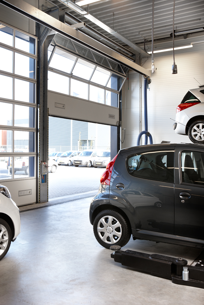 Peugeot dealerships use Compact doors at workshop