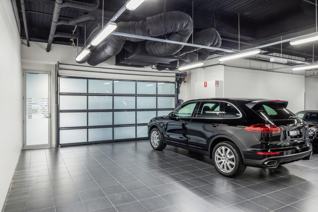 Compact door as a partition wall in a car dealership